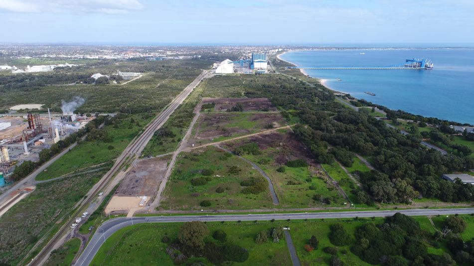 BEFORE Landscape of the Kwinana Terminal A Soil Remediation performed by Focus Demolition showing green Kwinana grass and dirt patch.