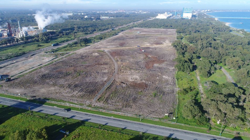 DURING Landscape of the Kwinana Terminal A Soil Remediation performed by Focus Demolition showing green Kwinana grass and dirt patch.