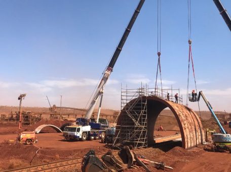 Demolition of rail tunnel bridge in an operating live mine site.