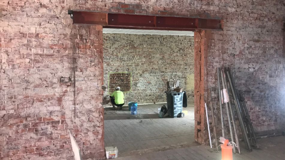 Internal demolition services being performed by Focus Demolition inside a red brick heritage listed building in Perth.