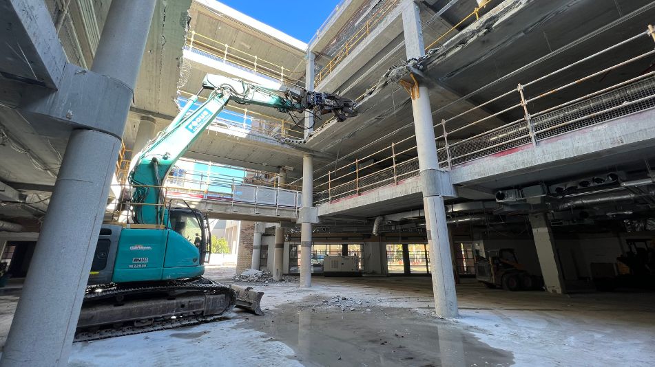 Heavy machinery at work inside Midland Square performing a heavy duty structural demolition and gripping onto one of the floors.